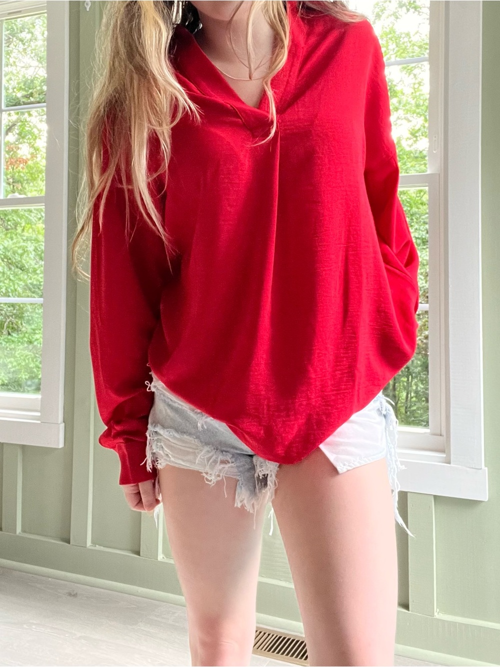 red silky blouse